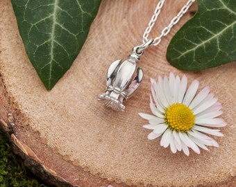 Sterling silver poppy seed pod necklace.