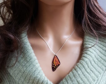 Monarch butterfly wing necklace on a 925 sterling silver 16 or 18 inch chain. Handmade cruelty free iridescent boho style butterfly wings.