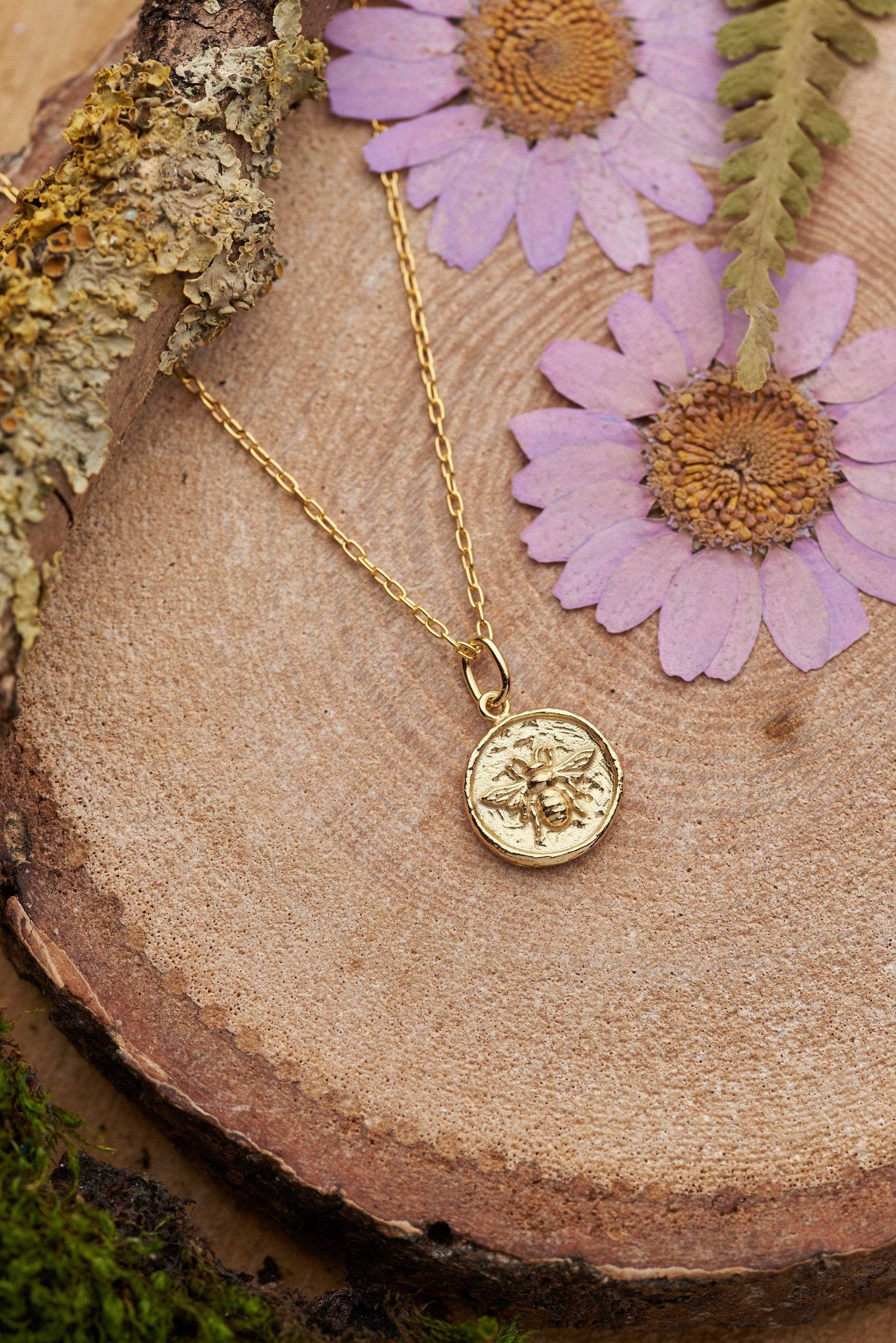 Bee coin pendant deals