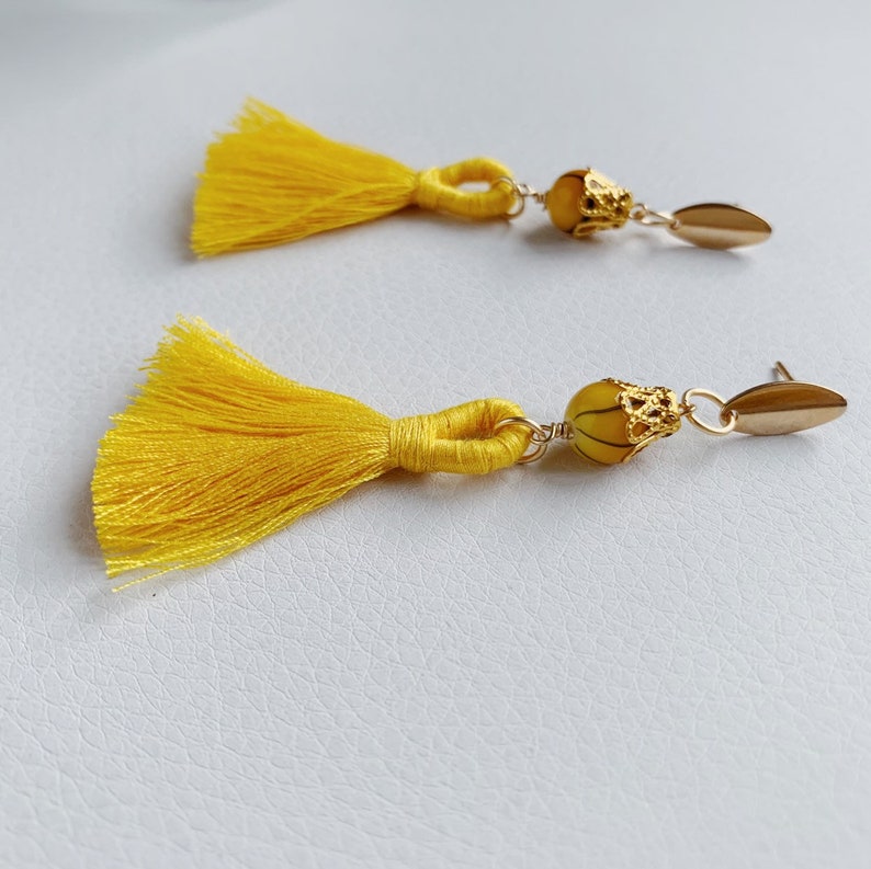 Yellow gold beaded cotton tassel earrings