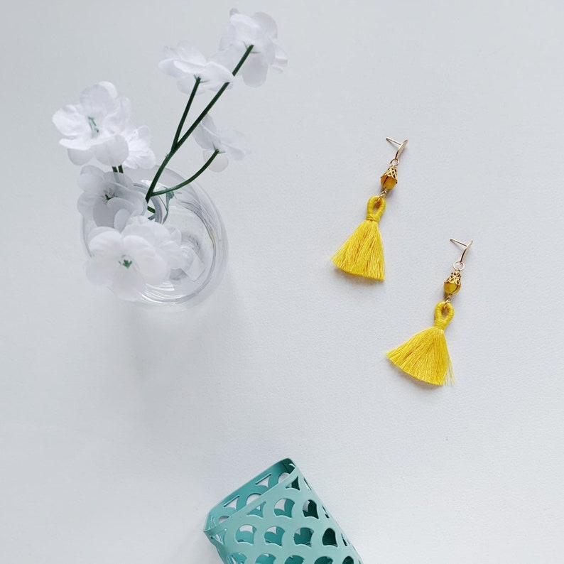 Yellow gold beaded cotton tassel earrings
