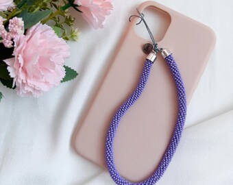 Cinturino per telefono con ciondolo fatto a mano con perline di semi viola