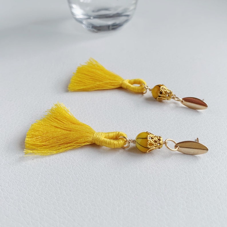 Yellow gold beaded cotton tassel earrings