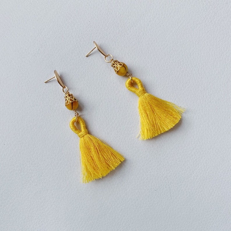 Yellow gold beaded cotton tassel earrings