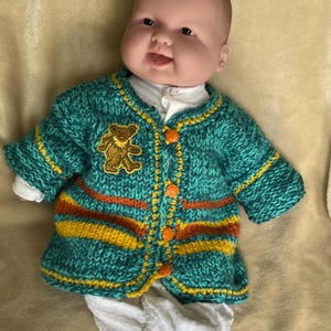 Hand-Knit Dancing Bear Sweater for Infants, Acrylic.