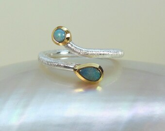 delicate ring with two opals, adjustable