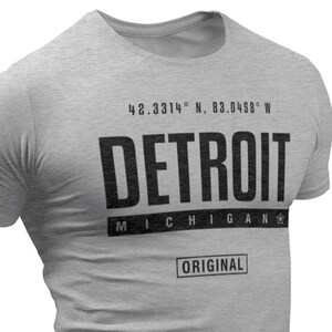 Detroit T-Shirts: Detroit GPS GEOTAG Coordinates T-Shirt by Detroit Rebels. 75+ Detroit-themed shirts, Great Michigan souvenir gift idea.