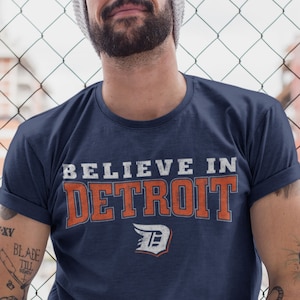 Detroit T-Shirts: Believe in Detroit T-Shirt by Detroit Rebels Brand. 75+ Detroit-themed shirts, Great Michigan souvenir gift idea.