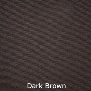 May include: Close-up of a dark brown fabric with a textured weave. The words "Dark Brown" are displayed in white at the bottom of the image, indicating the color of the material. The fabric appears to be a solid color.