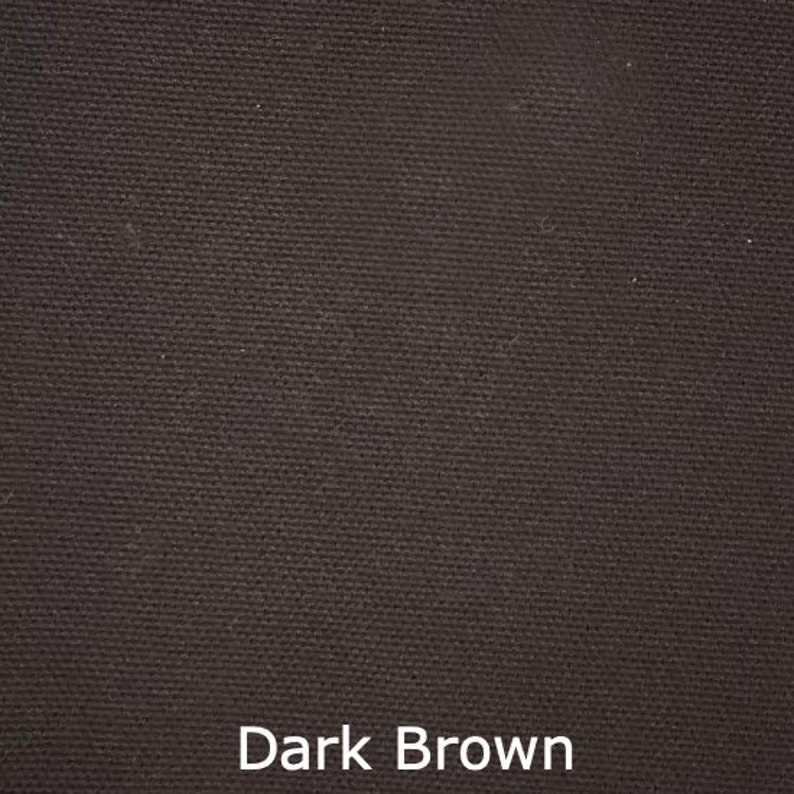 May include: Close-up of a dark brown fabric with a textured weave. The words "Dark Brown" are displayed in white at the bottom of the image, indicating the color of the material. The fabric appears to be a solid color.