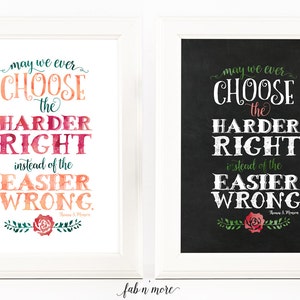 May include: Two framed prints with a white background and a black background. The prints feature a quote that reads "May we ever choose the harder right instead of the easier wrong." The quote is written in a decorative font with a watercolor effect. The prints are decorated with a red rose and green leaves.