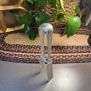 Antique French, Christofle silver plated tongs with ridges and maker marks,  1900s