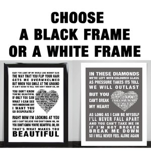 May include: Two framed prints with song lyrics. One is in a black frame, the other in a white frame. The black framed print has lyrics from "What Makes You Beautiful" by One Direction. The white framed print has lyrics from "Diamonds" by Rihanna.