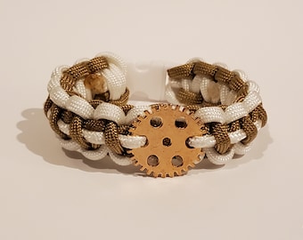 Pulsera de paracord steampunk blanca y dorada