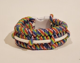 Porta púas de guitarra de color marrón y tostado con cuentas de calavera.