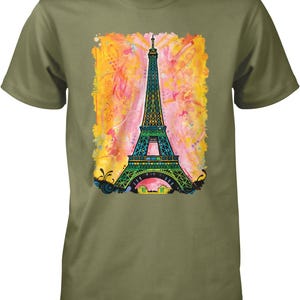 A green t-shirt with a colorful graphic design depicting the Eiffel Tower.