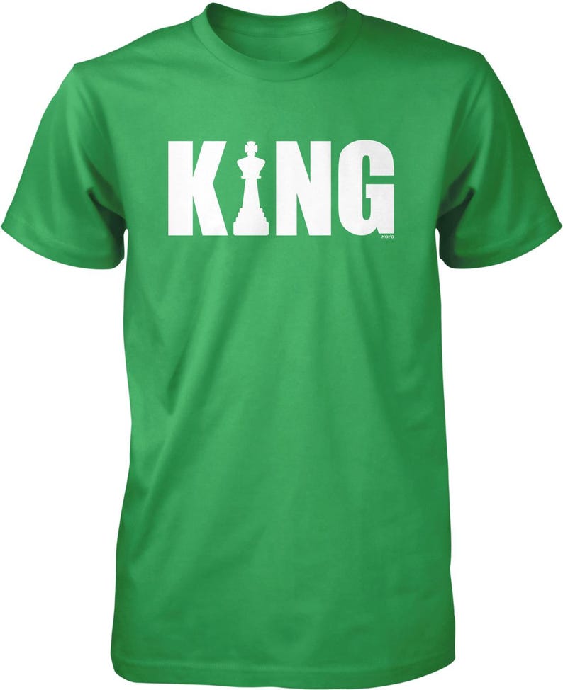 A green t-shirt with the word "KING" printed in white letters.