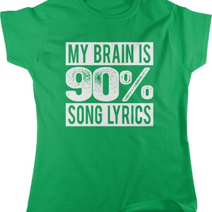 A green t-shirt with the text "MY BRAIN IS 90% SONG LYRICS" printed on it.