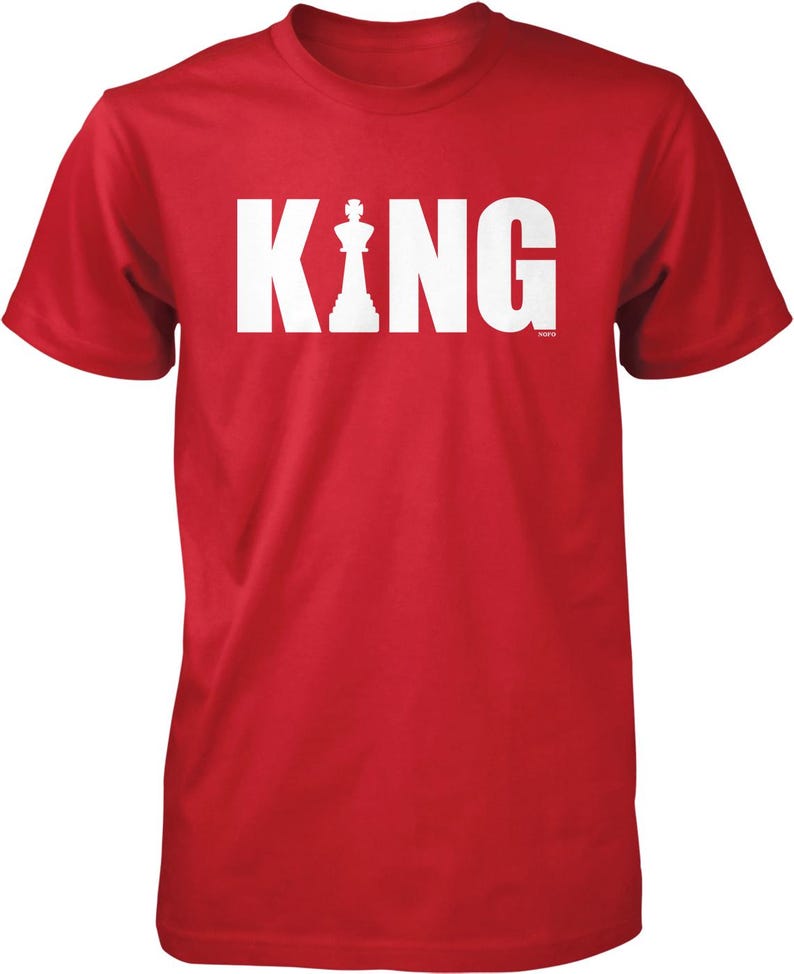 A red t-shirt with the word "KING" printed in white letters.