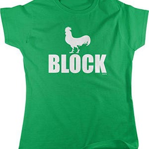 May include: A green t-shirt with a white rooster graphic above the word "BLOCK" in bold, capital letters. The shirt has short sleeves and a crew neck. The text "NOFO" is below the word "BLOCK".