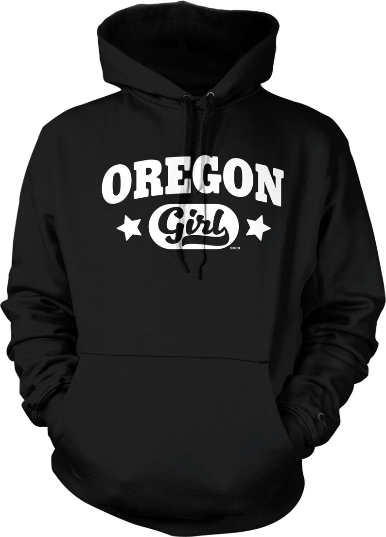 A black hoodie with the text "OREGON GIRL" printed on it in white.