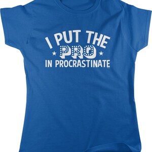 A blue t-shirt with the text "I PUT THE PRO IN PROCRASTINATE" printed on it.