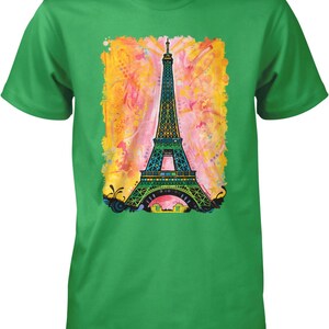 A green t-shirt with a colorful painting of the Eiffel Tower in the center.