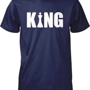 A navy blue t-shirt with the word "KING" printed in white letters.