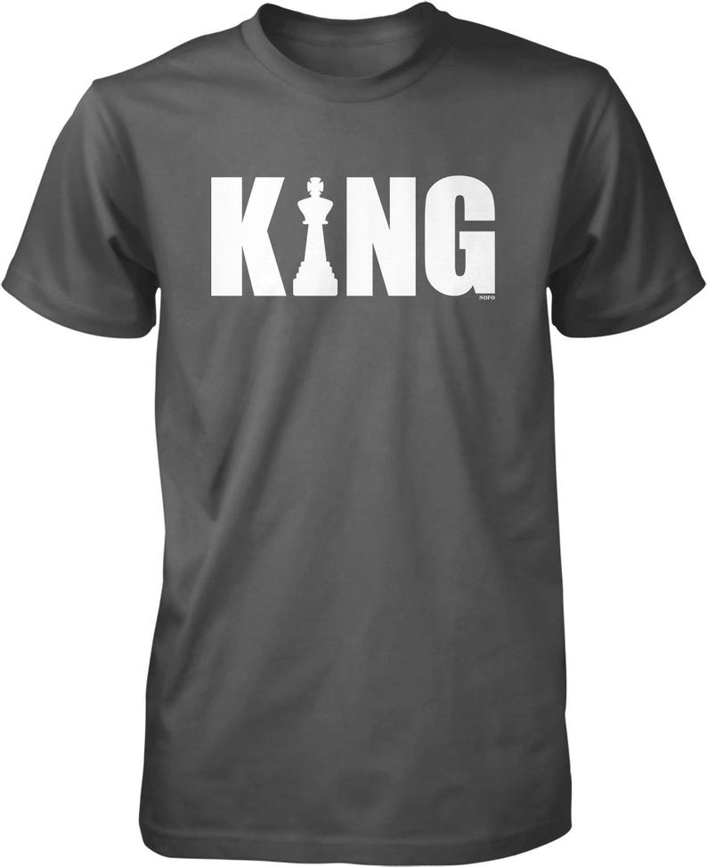 A gray t-shirt with the word "KING" printed in white letters.