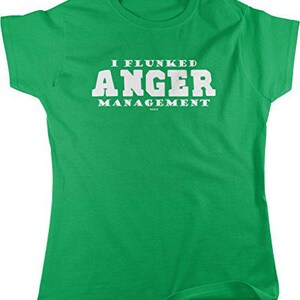 May include: A bright green t-shirt with the text "I Flunked Anger Management" in bold white letters. The shirt has a crew neck and short sleeves. The text is centered on the front of the shirt.