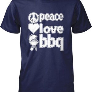 A navy blue t-shirt with white text that says "Peace I love BBQ".