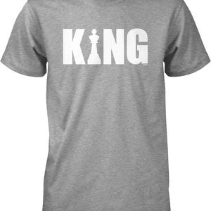 A gray t-shirt with the word "KING" printed in white letters.