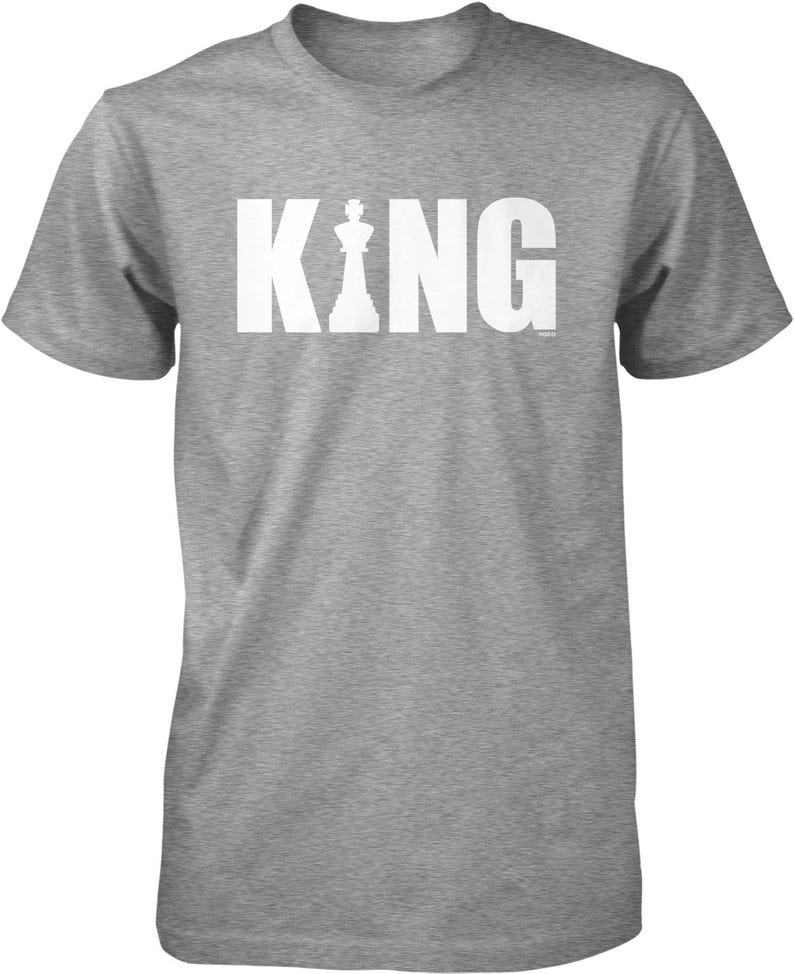 A gray t-shirt with the word "KING" printed in white letters.