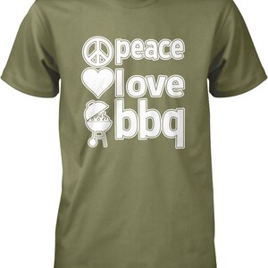 A green t-shirt with white text that says "Peace I love BBQ".