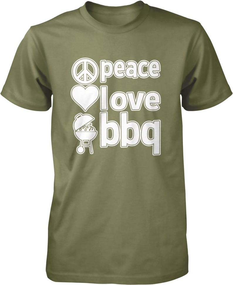 A green t-shirt with white text that says "Peace I love BBQ".