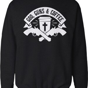 May include: Black sweatshirt with a white graphic design that says "God, Guns & Coffee" with a cross on a coffee cup and two crossed pistols.