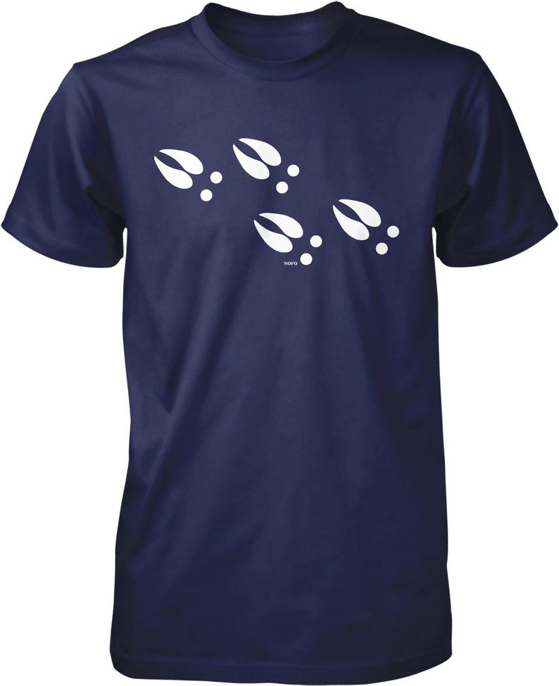A navy blue t-shirt with white paw prints printed on it.