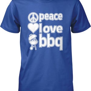 A blue t-shirt with white text that says "Peace I love BBQ".