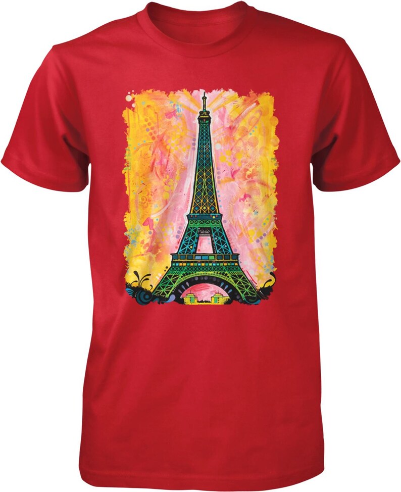 A red t-shirt with a colorful painting of the Eiffel Tower in the center.