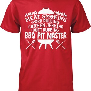 A red t-shirt with white text and graphics related to BBQ and cooking.