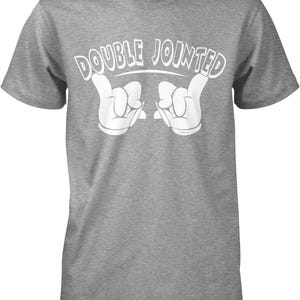 A gray t-shirt with the text "DOUBLE JOINED" printed on it, along with a hand gesture.