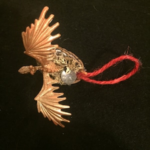 Dragons nest with golden dragon Yuletide tree decoration