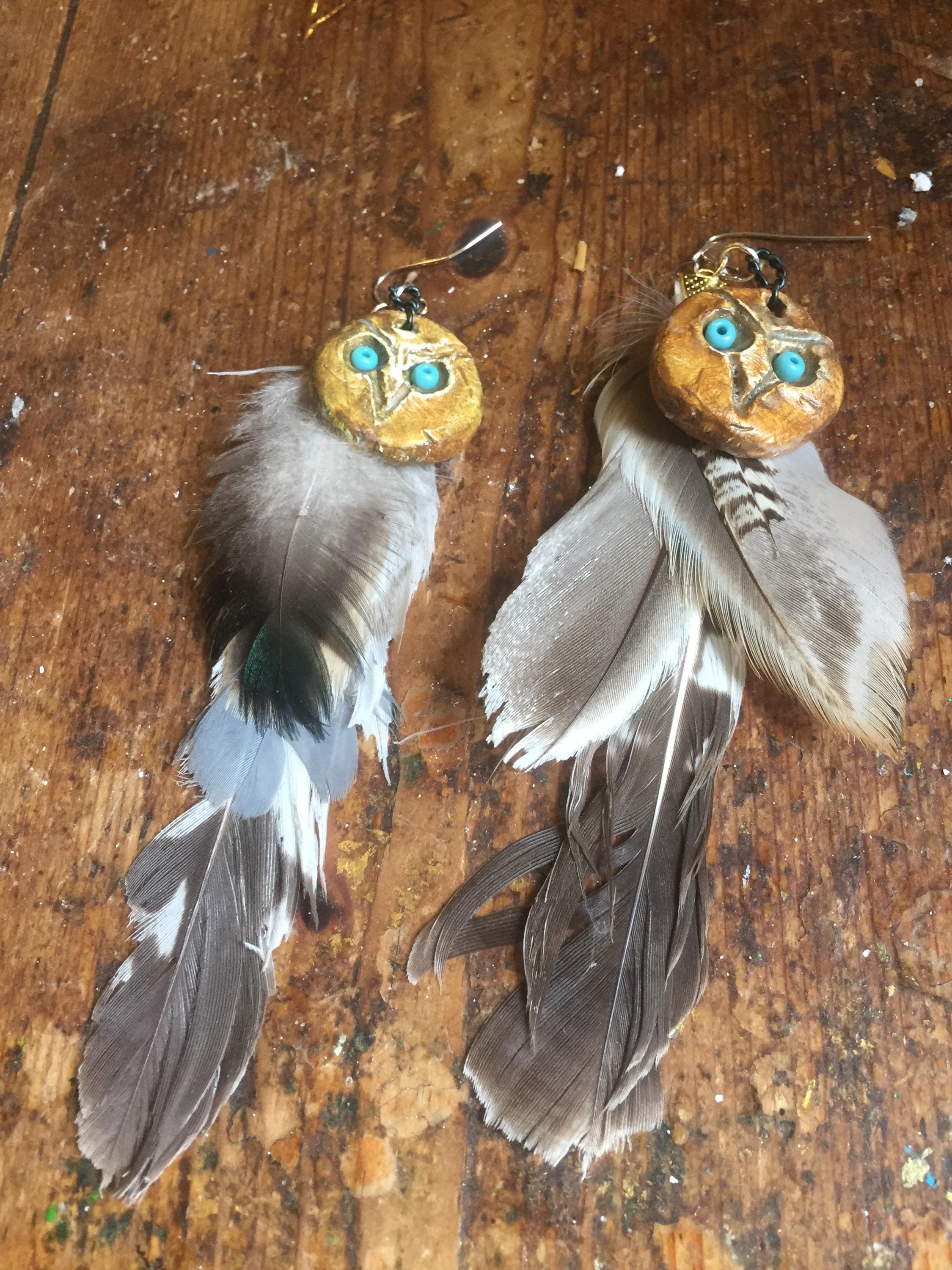 Ceramic owl earrings with found beach feathers