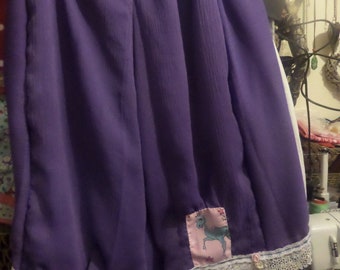 Bloomers púrpura con parche de unicornio