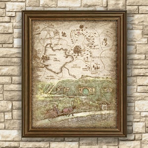 May include: A vintage-style map of the Shire from The Hobbit, featuring Hobbiton, The Tooks, and The Old Forest. The map is printed on parchment-like paper and framed in a brown wood frame.