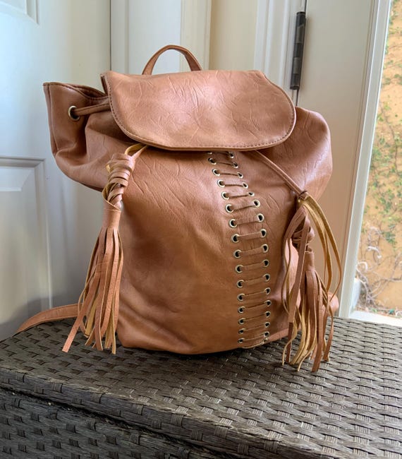 Vintage, Retro, Boho 1970s Tan Faux Leather Backpack, Knapsack, W Magnetic Button, Adjustable Straps & Drawstring W Fringe Tassels - Etsy Vintage, Retro, Boho 1970s Tan Faux Leather Backpack, Knapsack, W Magnetic Button, Adjustable Straps & Drawstring W Fringe Tassels - Etsy