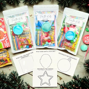 May include: Christmas-themed activity kits for kids, featuring clear bags with crayons, candies, and toys. The bags are labeled "For the Kids, Jolly Fun." Additional items include a gingerbread house-shaped box, drawing templates, and a bag of Haribo Goldbears.