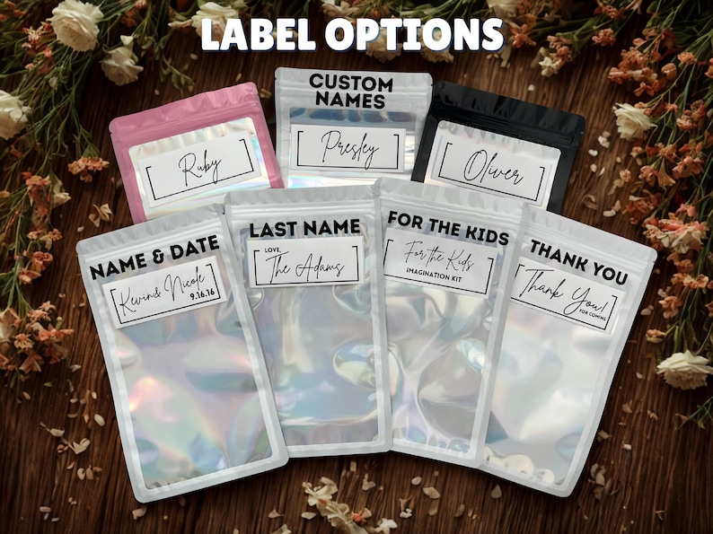May include: An assortment of clear, iridescent pouches with various label options. Labels include names like "Ruby," "Presley," and "Oliver," along with phrases such as "Name & Date," "Last Name," "For the Kids," and "Thank You." The text "Label Options" is at the top.