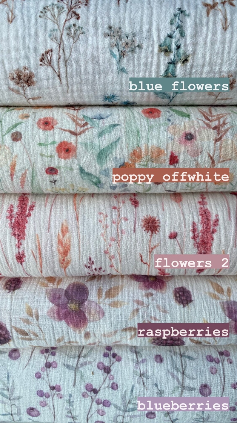 May include: Five different fabric swatches with floral patterns. The top swatch features blue flowers, the second swatch features poppy flowers in off-white, the third swatch features pink flowers, the fourth swatch features pink raspberries, and the bottom swatch features purple blueberries.