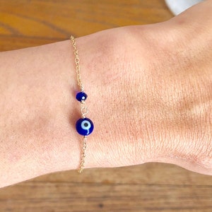 Blue Evil eye bracelet, dainty gold bracelet, tiny evil eye, protection bracelet, sapphire gemstone, good luck charm, September Birthstone